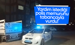 Yardım istediği polis memurunu tabancayla vurdu