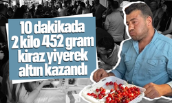 10 dakikada 2 kilo 452 gram kiraz yiyerek altın kazandı