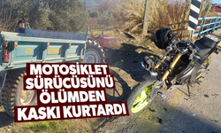 Traktörle çarpışan motosiklet sürücüsünü kaskı kurtardı