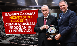 Başkan Özkasap ‘Hizmet Şeref Belgesi’ni Cumhurbaşkanı Erdoğan’ın elinden aldı