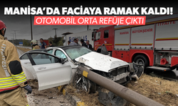 Kula’da faciaya ramak kaldı! Otomobil orta refüje çıktı