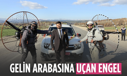 Paramotorla inip gelin arabasının önünü kestiler