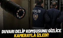Duvarı delip komşusunu gizlice kamerayla izledi!