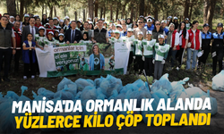 Manisa'da ormanlık alanda yüzlerce kilo çöp toplandı