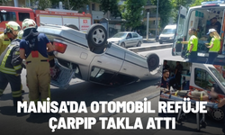 Manisa'da otomobil refüje çarpıp takla attı