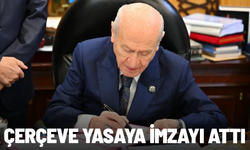 Bahçeli 'çerçeve yasa' teklifine ilk imzayı attı