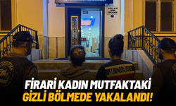 Firari kadın mutfaktaki gizli bölmede yakalandı