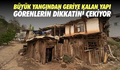 Büyük yangından geriye kalan yapı görenlerin dikkatini çekiyor