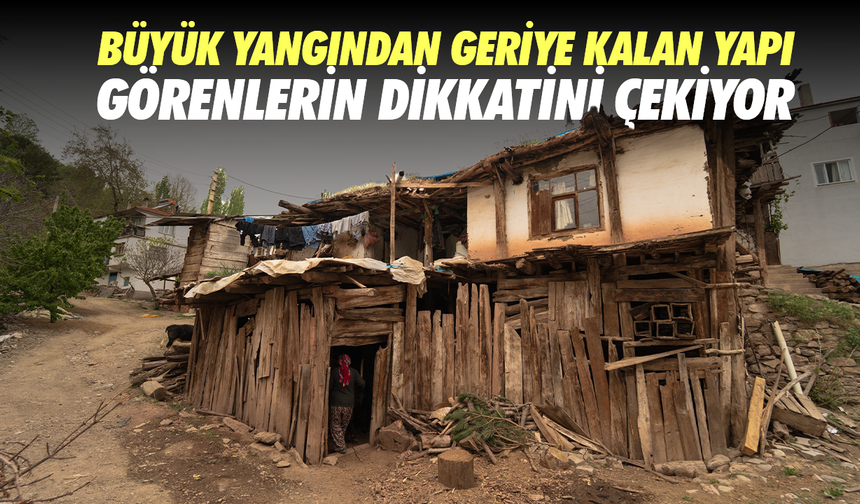 Büyük yangından geriye kalan yapı görenlerin dikkatini çekiyor