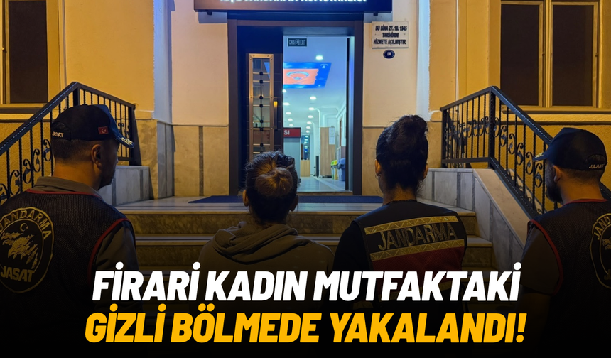 Firari kadın mutfaktaki gizli bölmede yakalandı